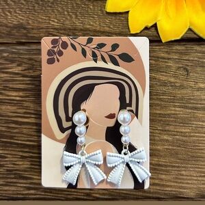 Pearl bow earrings